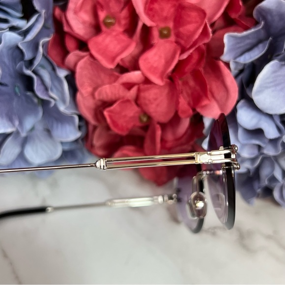 KINGSEVEN Retro Purple Gradient Oval Rimless Sunglasses - Picture 13 of 16